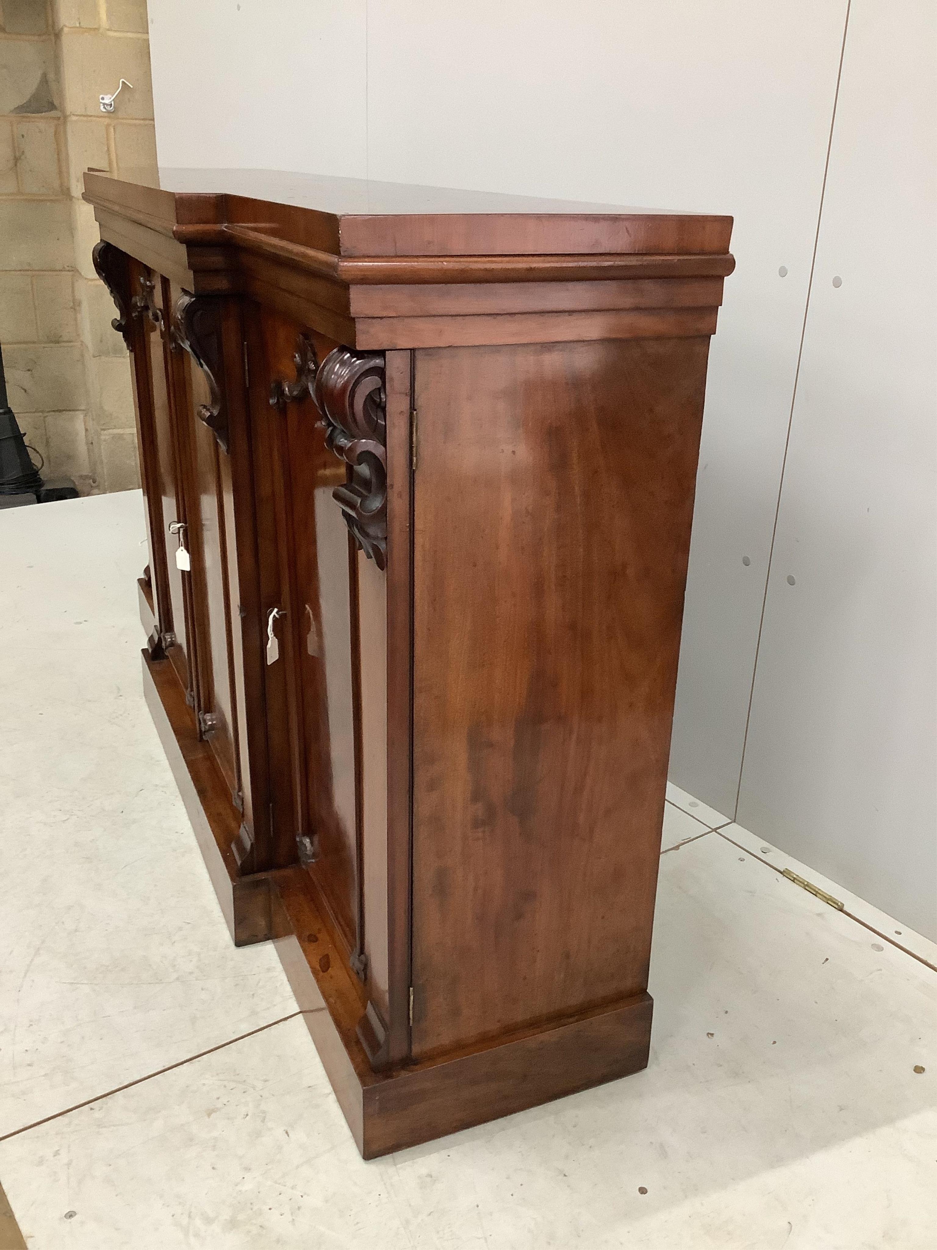 A mahogany breakfront dwarf bookcase, width 170cm, height 99cm. Condition - fair to good